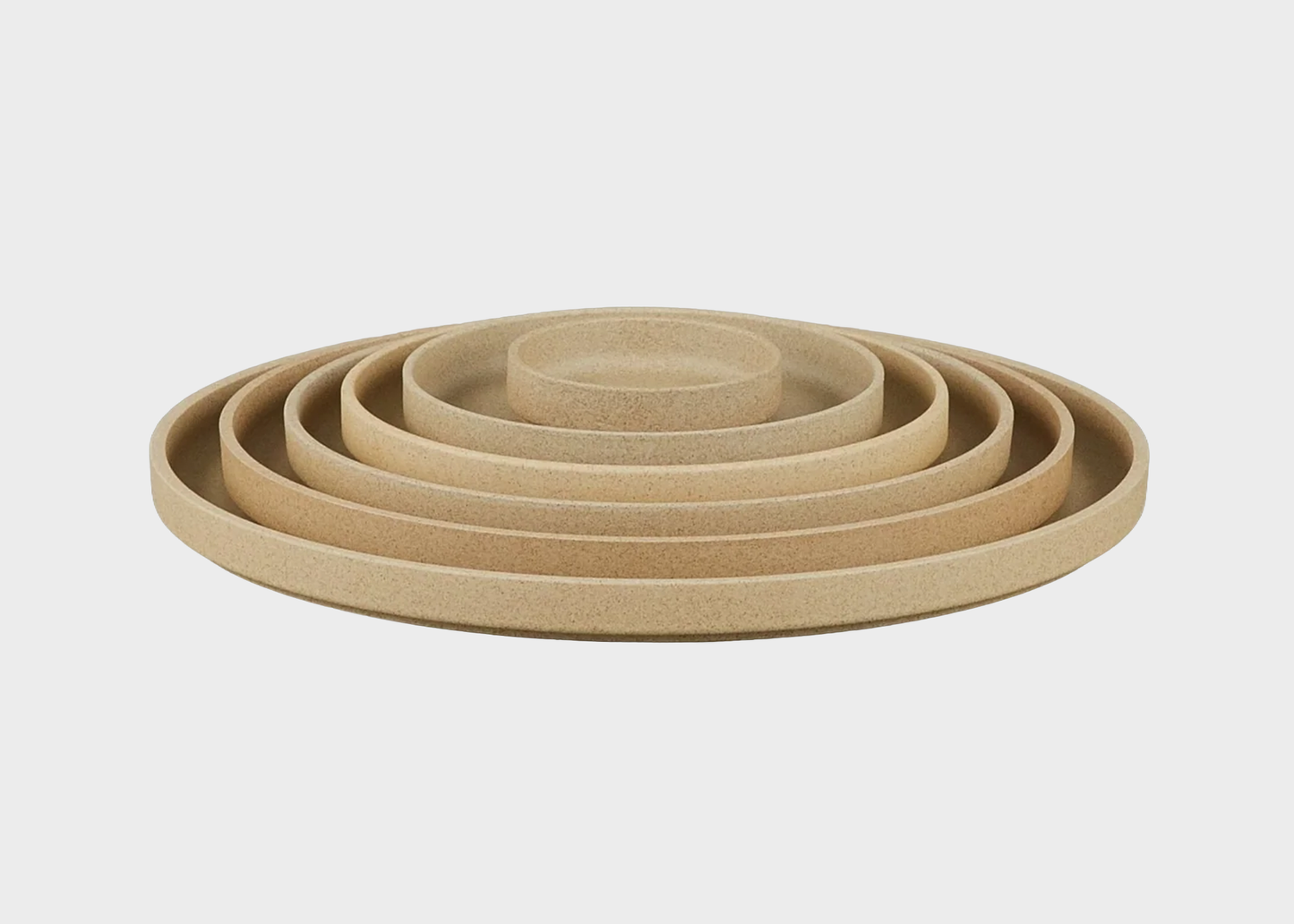 
                  
                    Set of Natural Hasami porcelain plates of different sizes on a light gray background
                  
                