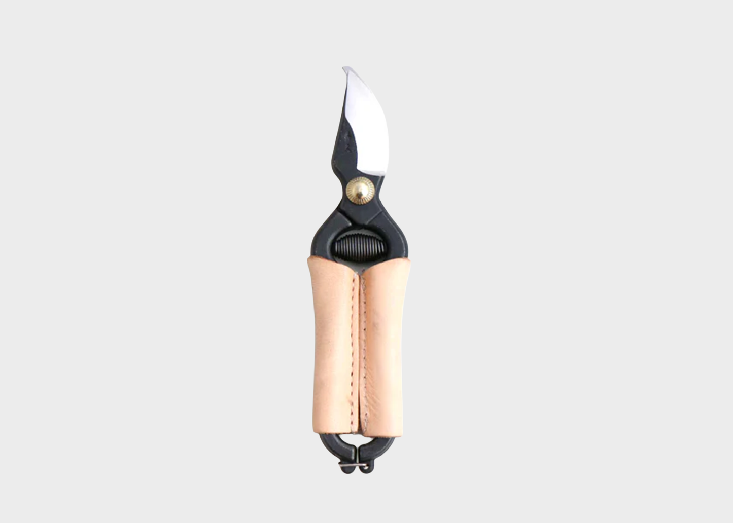 
                  
                    Gardening shears with leather handle on a light gray background
                  
                