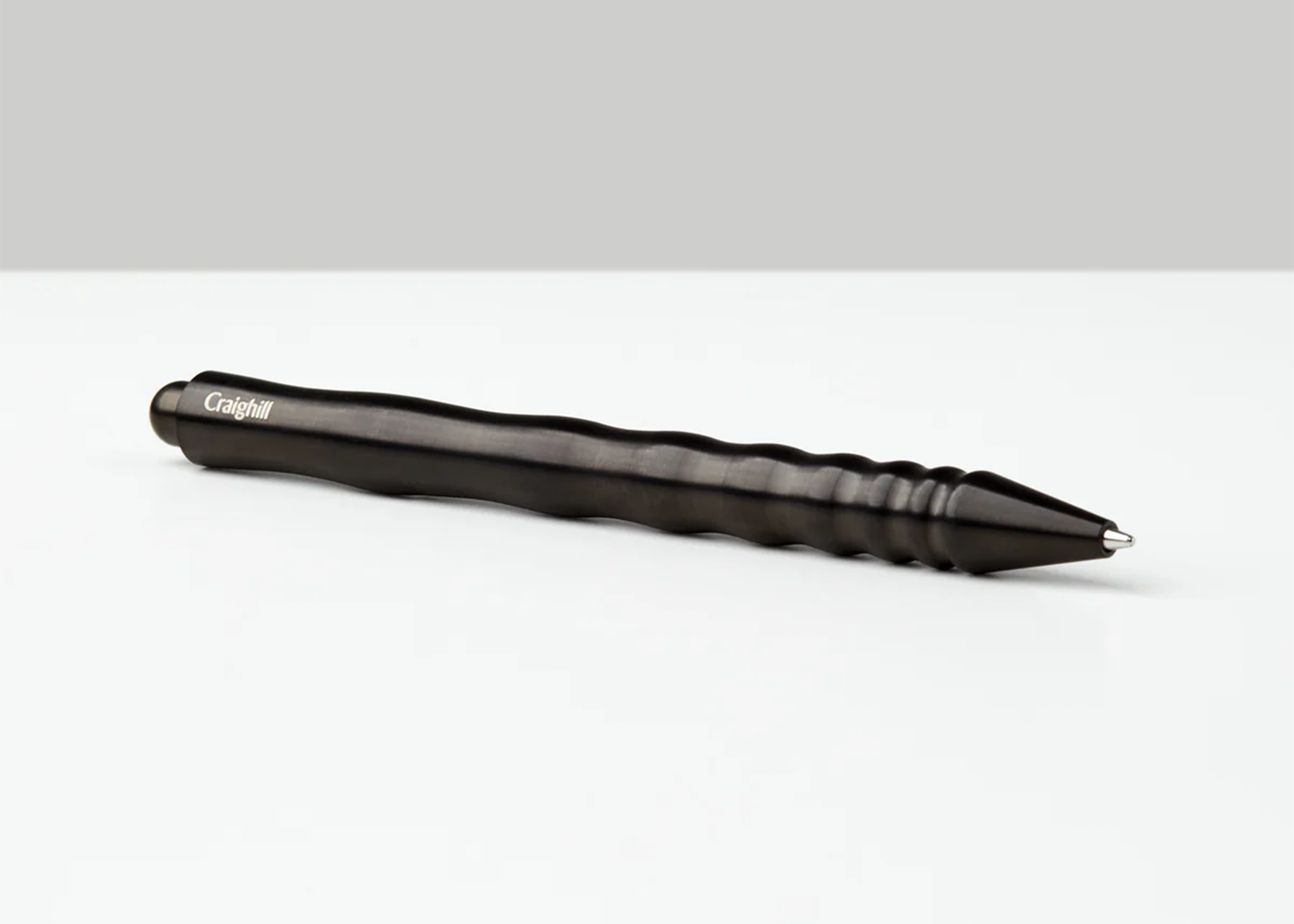 
                  
                    Black pen with visible brand name on a white background
                  
                