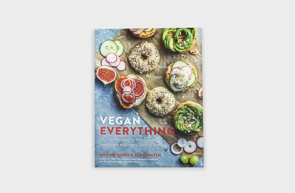 
                  
                    Vegan Everything Cookbook featuring a cover of vegan bagel recipes with avocado, fig, onions, cucumber, and more. 
                  
                