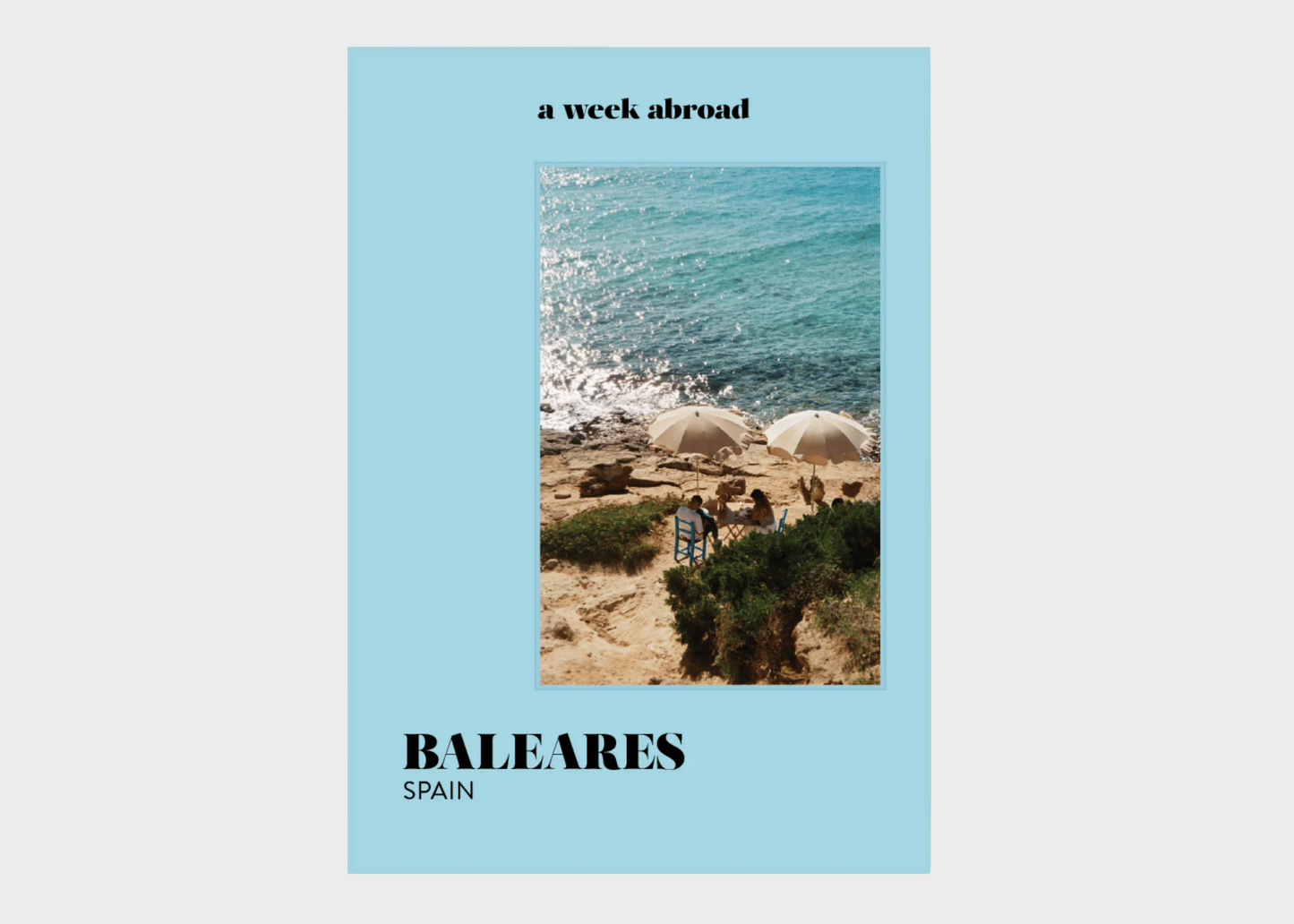 
                  
                    Book cover with a scenic view of the sea and beach, featuring text about a week abroad in Baleares, Spain.
                  
                