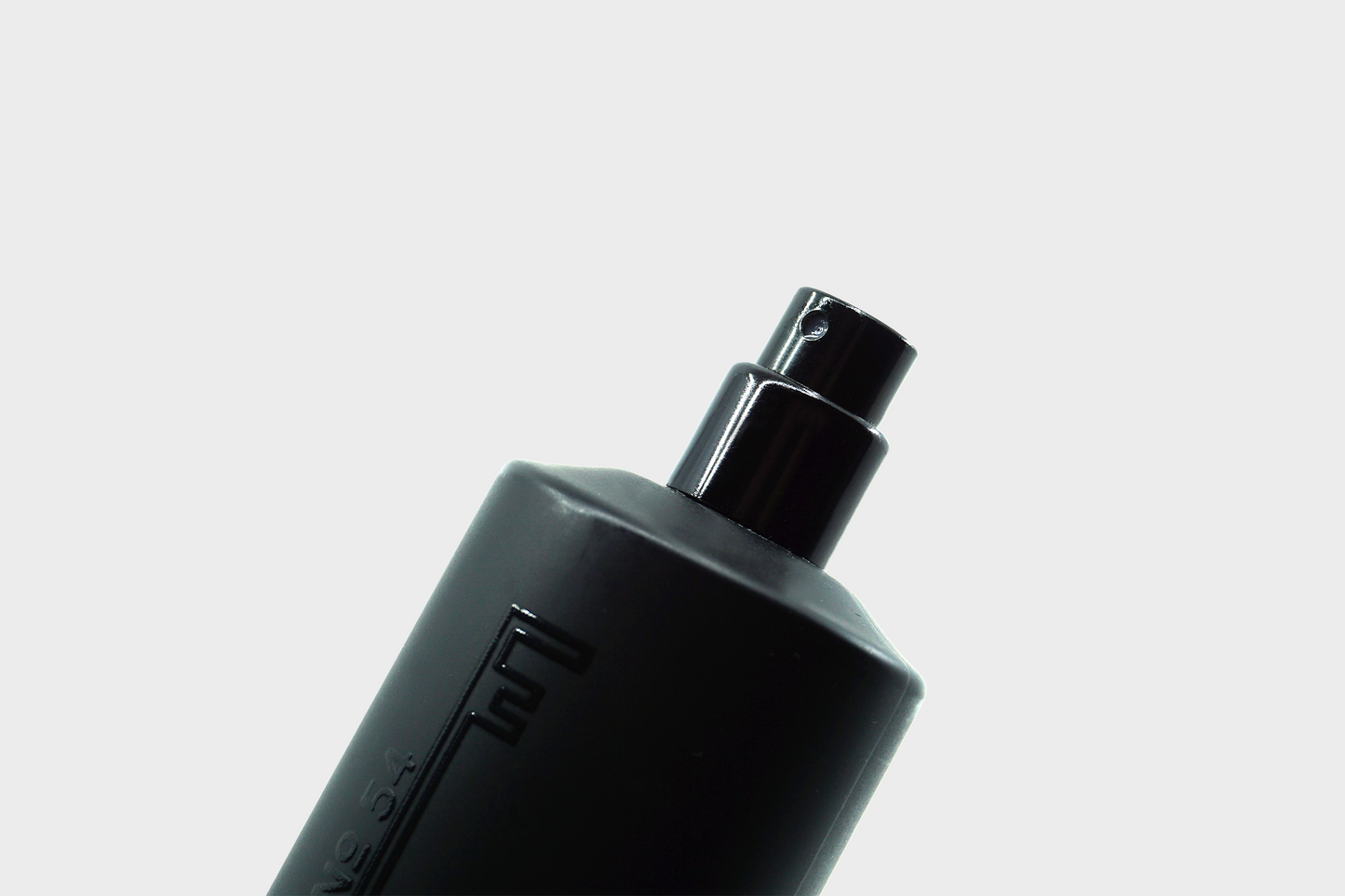 
                  
                    A black 50ml perfume bottle of Fischersund's No 54 perfume close up
                  
                
