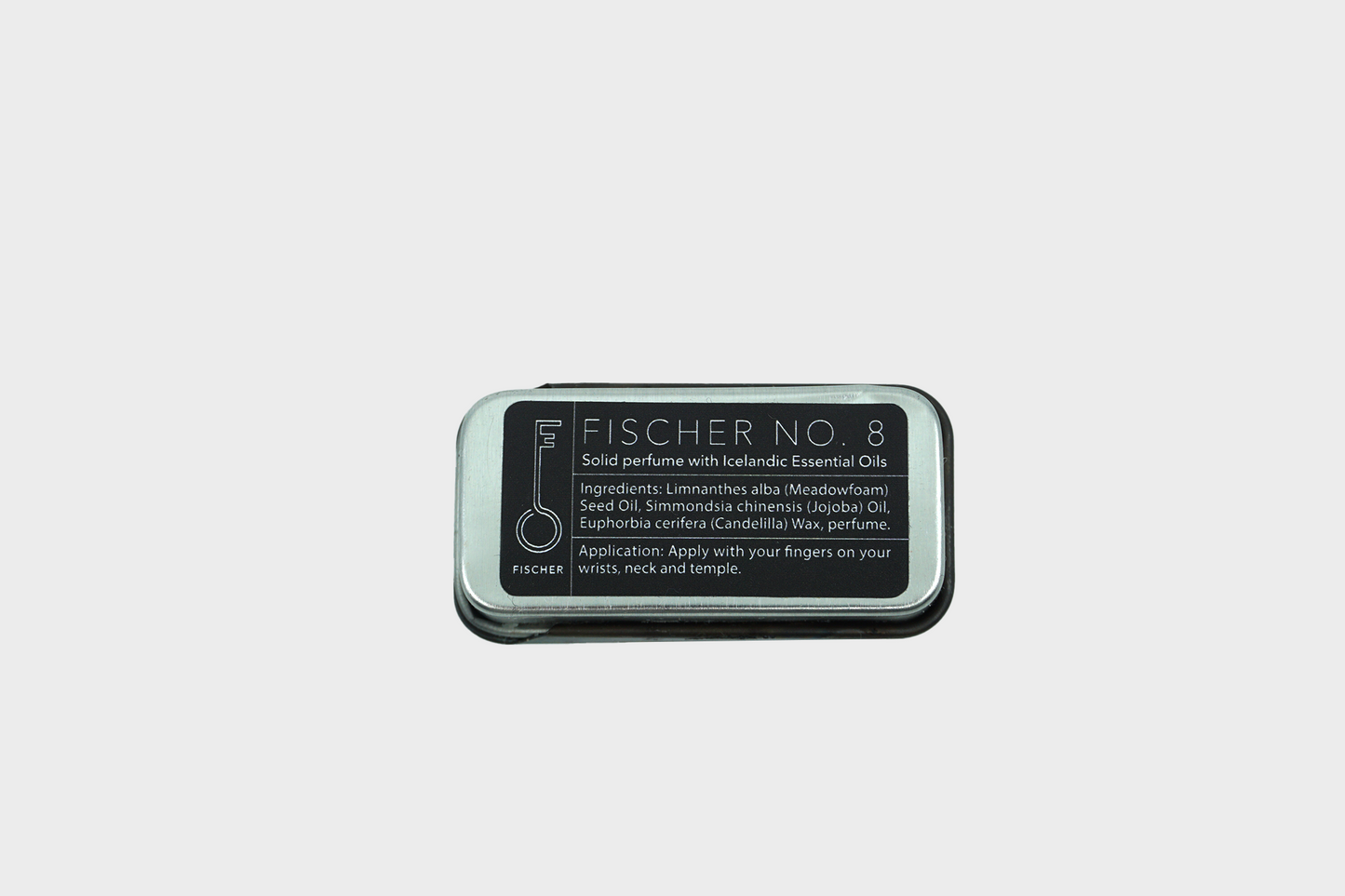 
                  
                    The back of Fischersund's solid perfume no 8 tin
                  
                