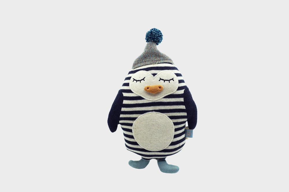 Small striped penguin stuffed animal with hat