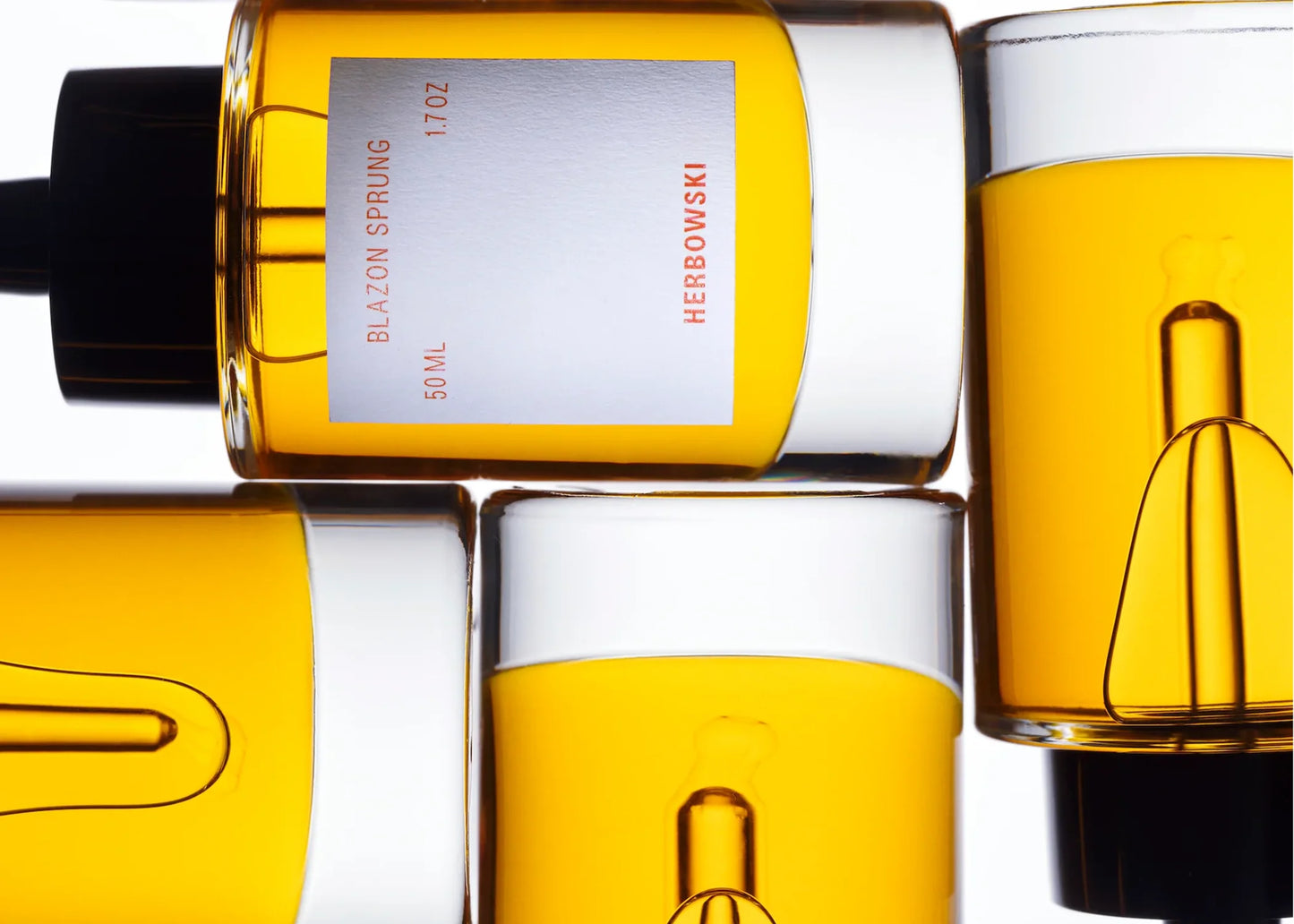 
                  
                    Herbowski Blazon Sprung face oil bottles next to each other
                  
                