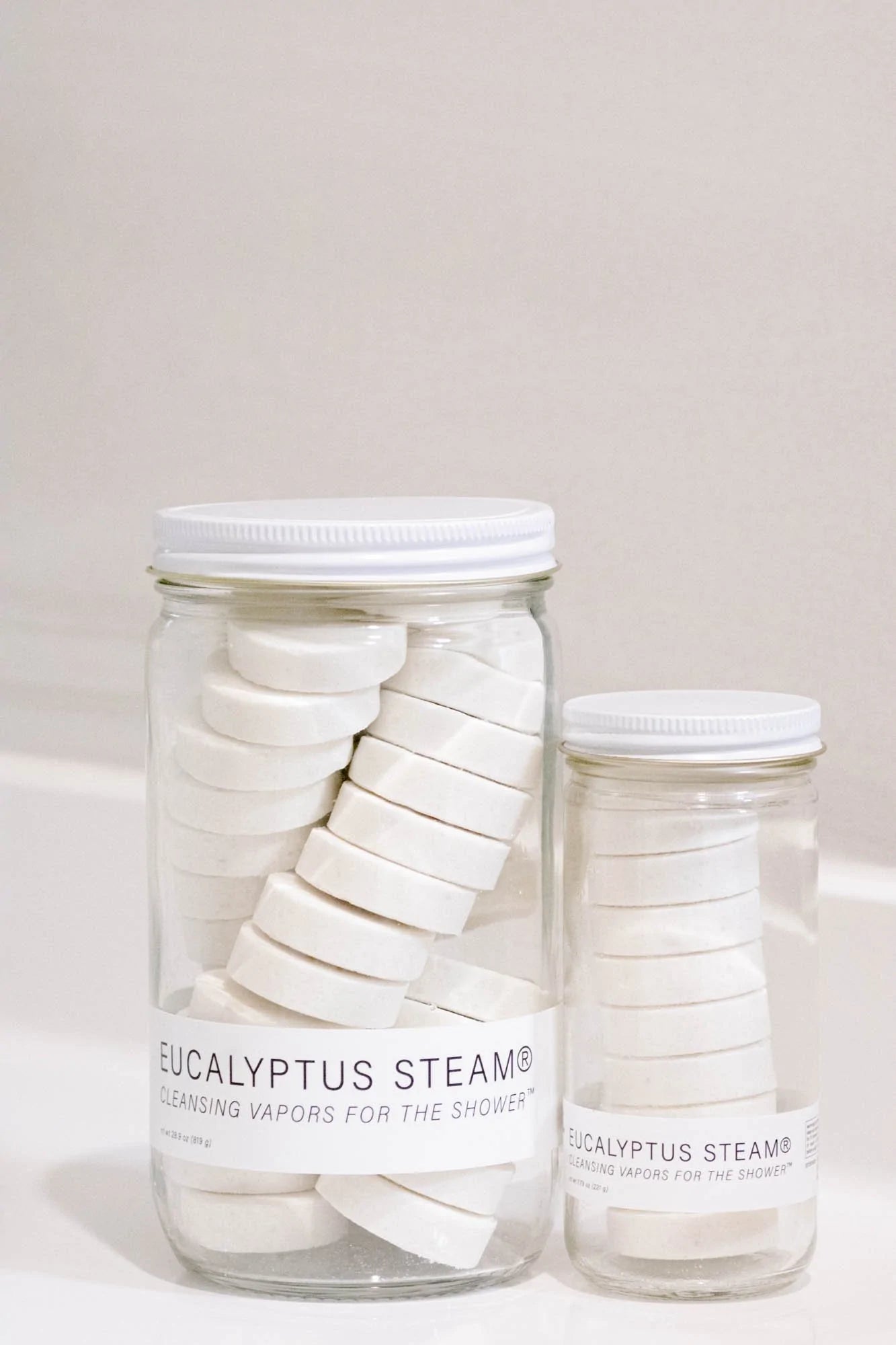 
                  
                    Eucalyptus Shower Steamers (Large) jar next to medium jar
                  
                