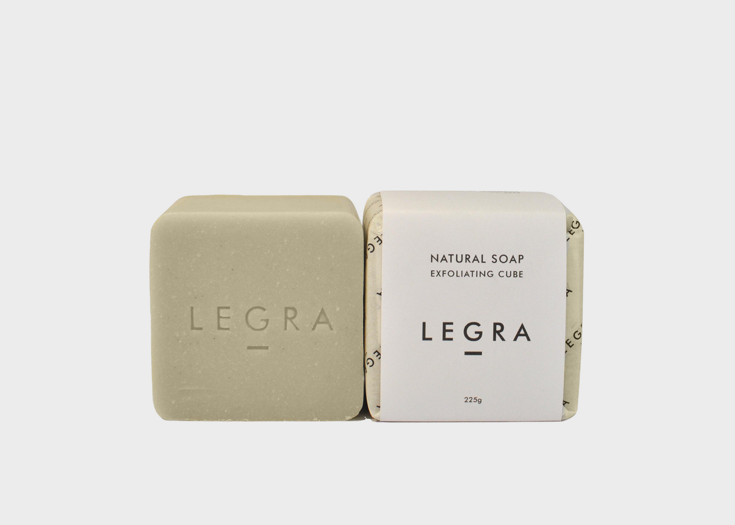 Legra Exfoliating Cube next to packaging