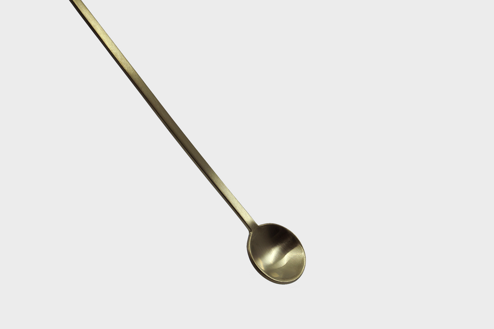 
                  
                    A brass Fein Long Spoon by Ferm Living
                  
                