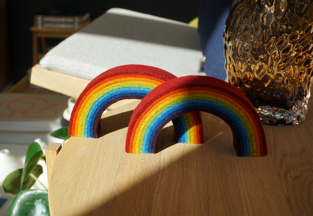Felt rainbows on the table top at Woodland Mod