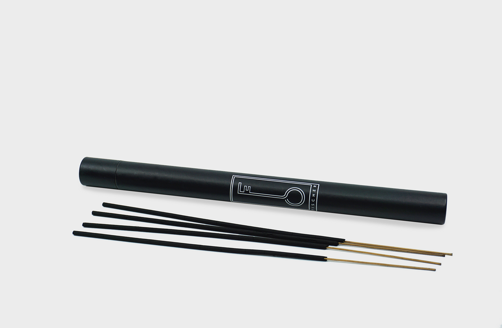Fischersund Incense sticks next to a black tube