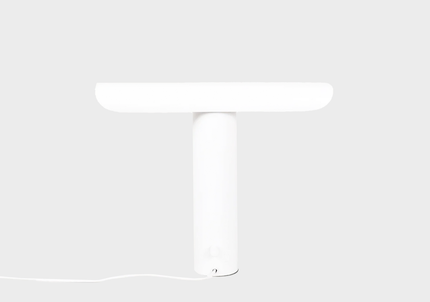 
                  
                    A white T-shaped FRAMA T-Lamp as sold by Woodland Mod
                  
                