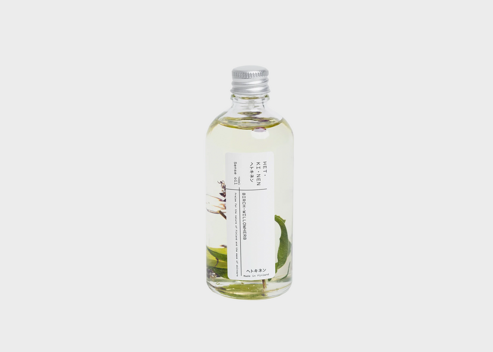 Hetkinen Sense Oil - Birch-Willowherb bottle with leaves in liquid