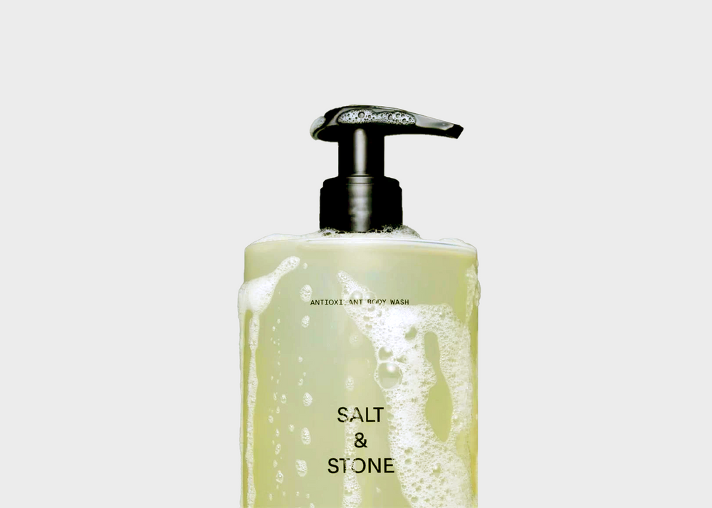 
                  
                    Salt & Stone Body Wash Bergamot and Eucalyptus bottle covered in bubbles
                  
                