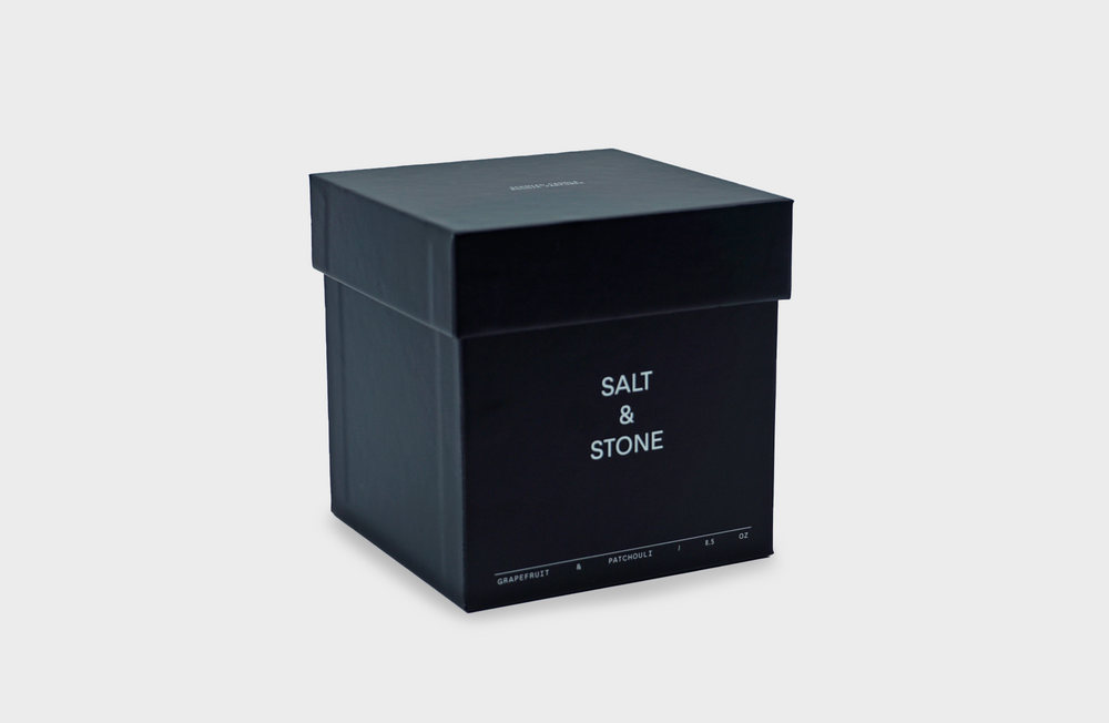 
                  
                    Grapefruit & Patchouli Candle by Salt and Stone in a black box
                  
                