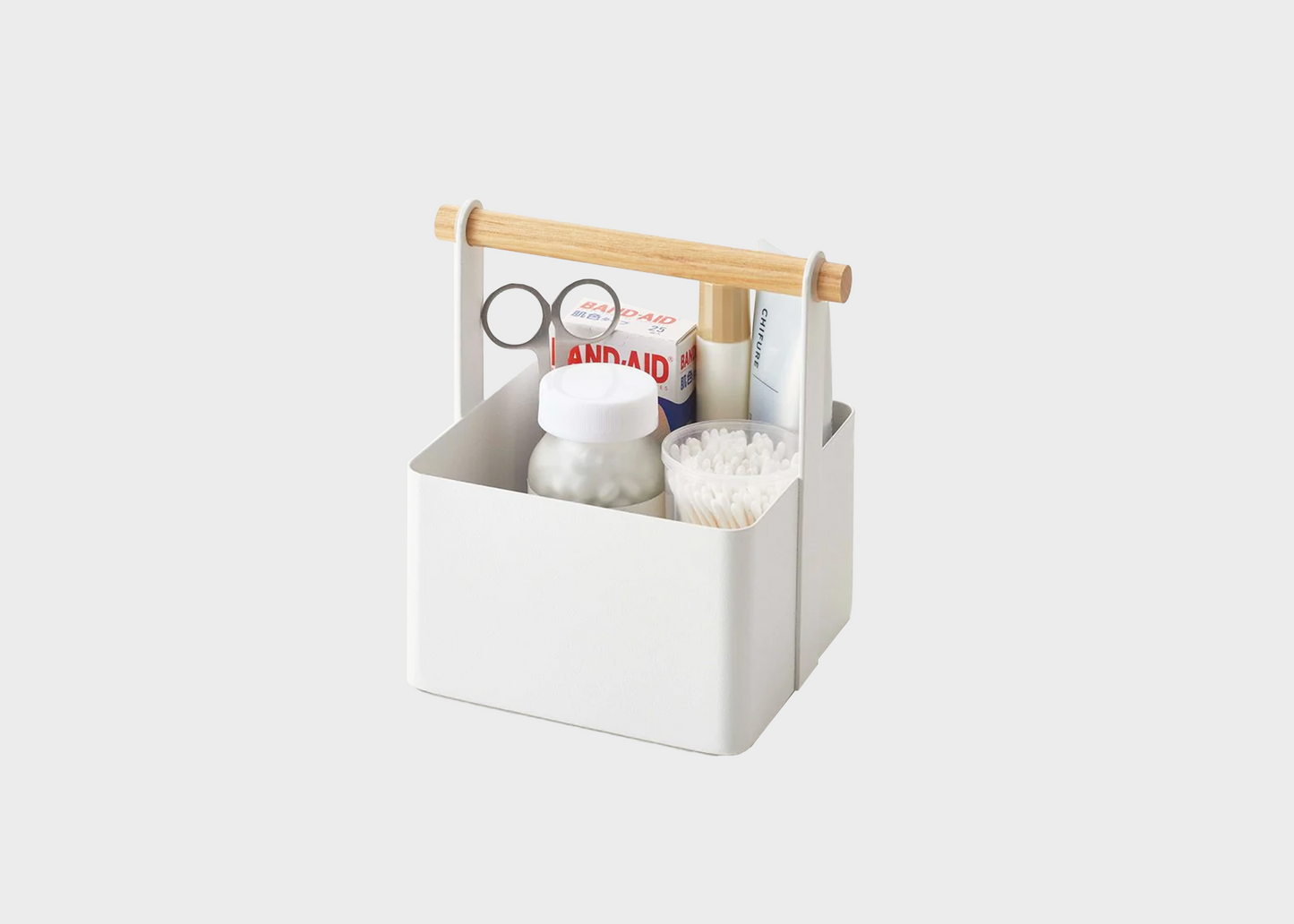 Small Storage Caddy in White by Yamazaki with bathroom supplies inside