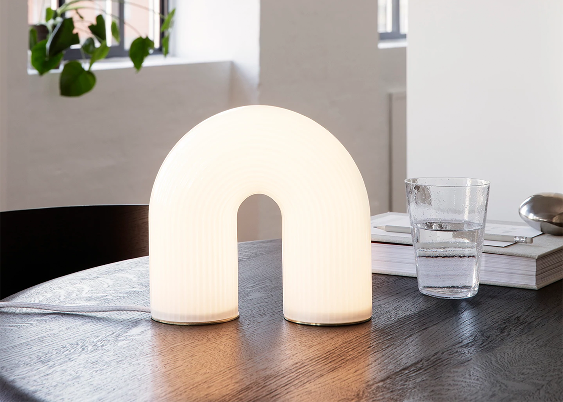 
                  
                    An illuminated Vuelta Lamp by Ferm Living as sold by Woodland Mod
                  
                